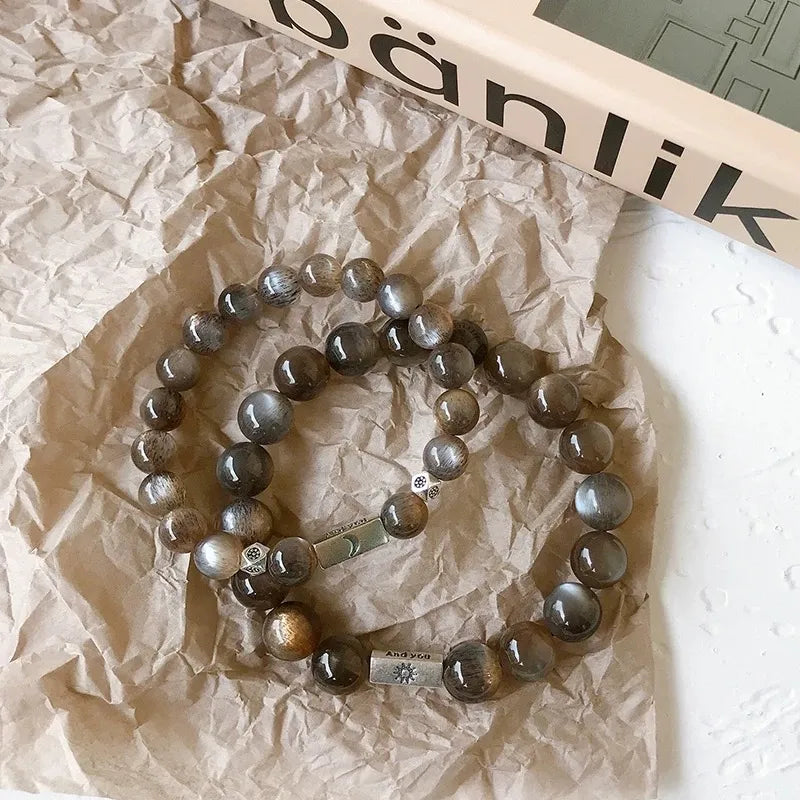 Moonstone Crystal Bracelet with Sun & Moon Charms – Mystical Black Sunstone Energy Jewelry