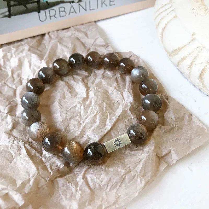Moonstone Crystal Bracelet with Sun & Moon Charms – Mystical Black Sunstone Energy Jewelry