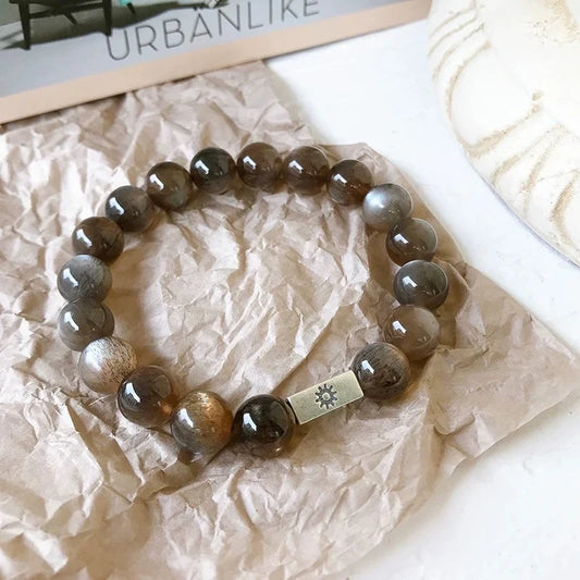 Moonstone Crystal Bracelet with Sun & Moon Charms – Mystical Black Sunstone Energy Jewelry